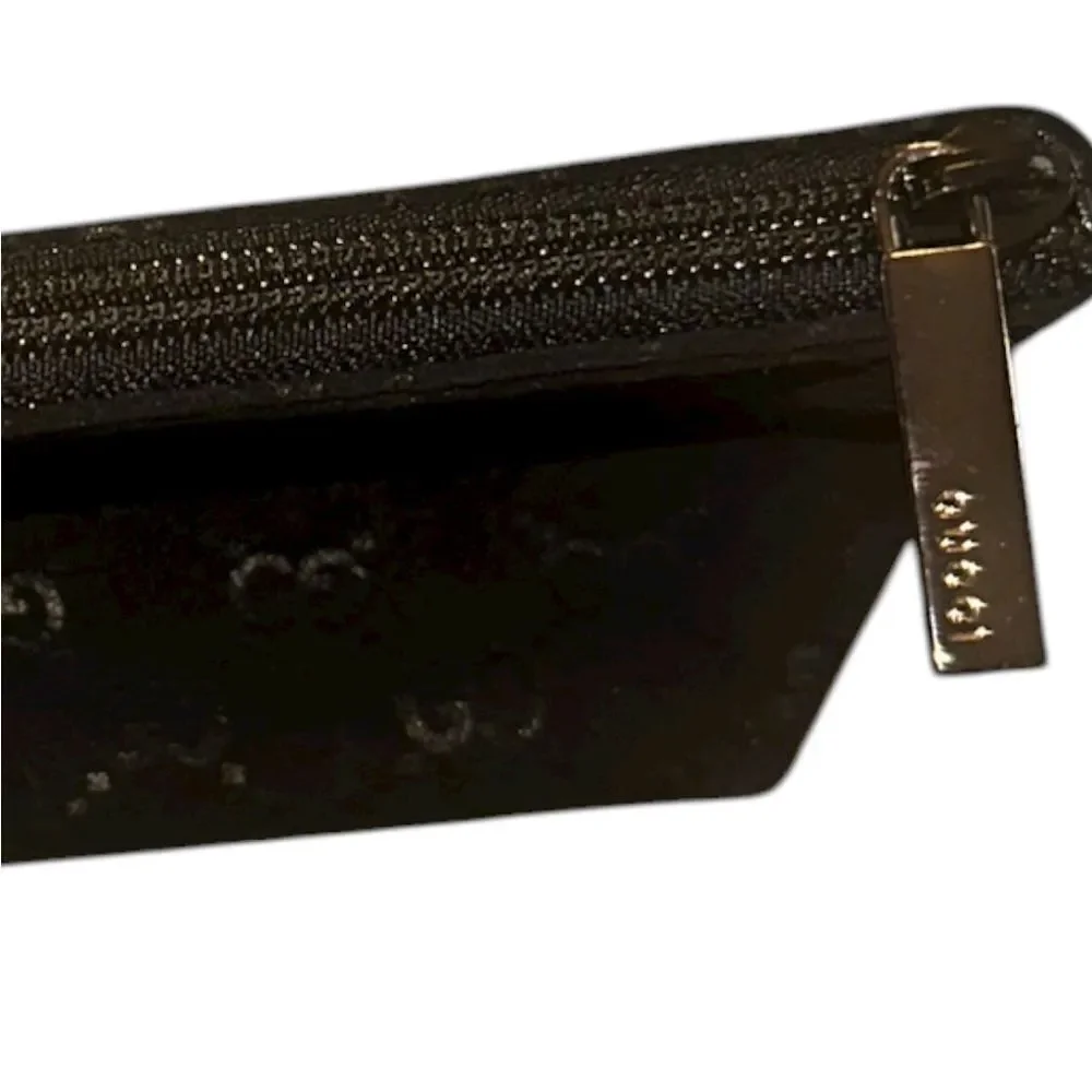 Gucci Textured Black velvet pouch.
